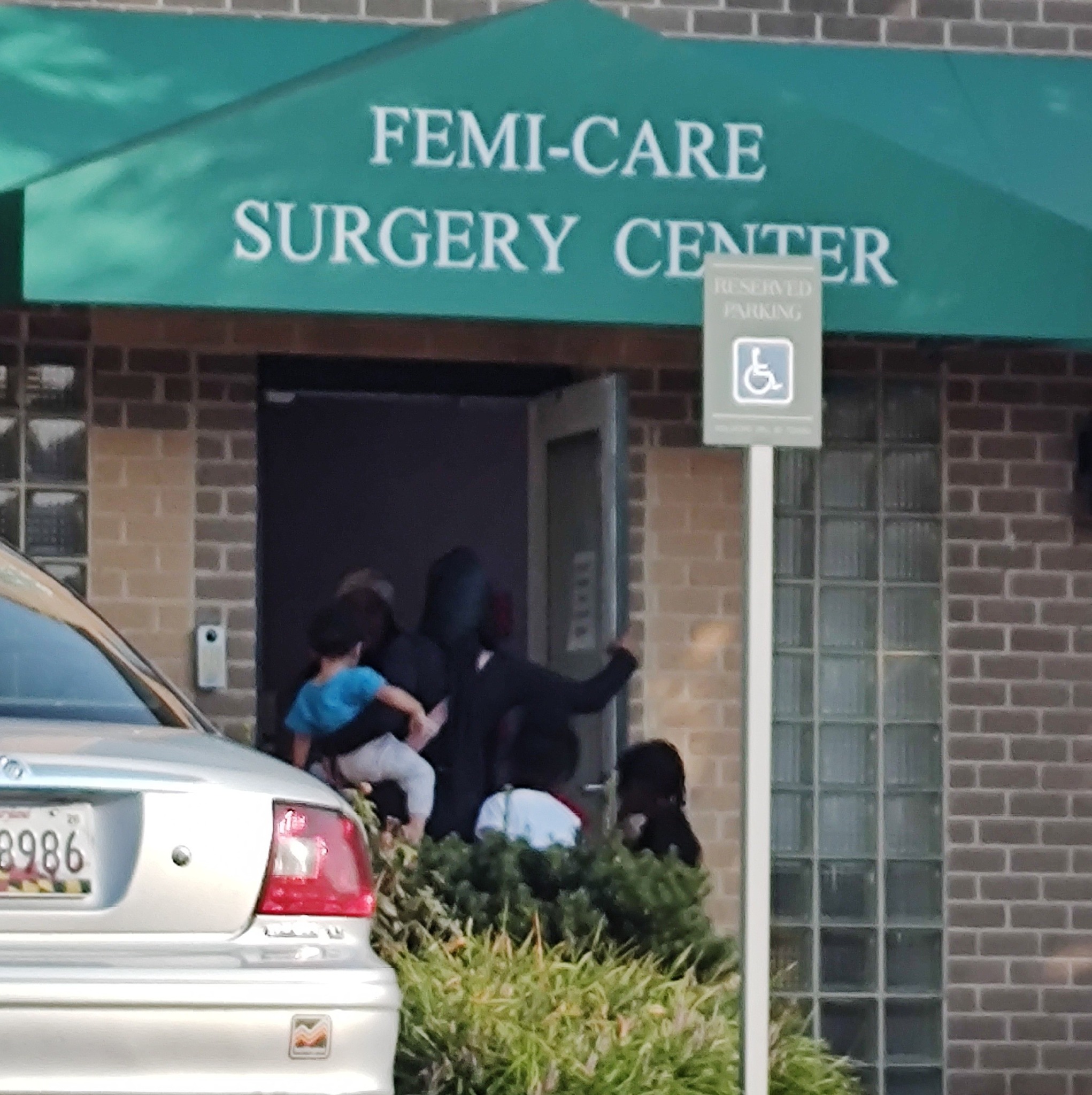 Preaching at the Femi "Care"Surgery Center where they murder babies.