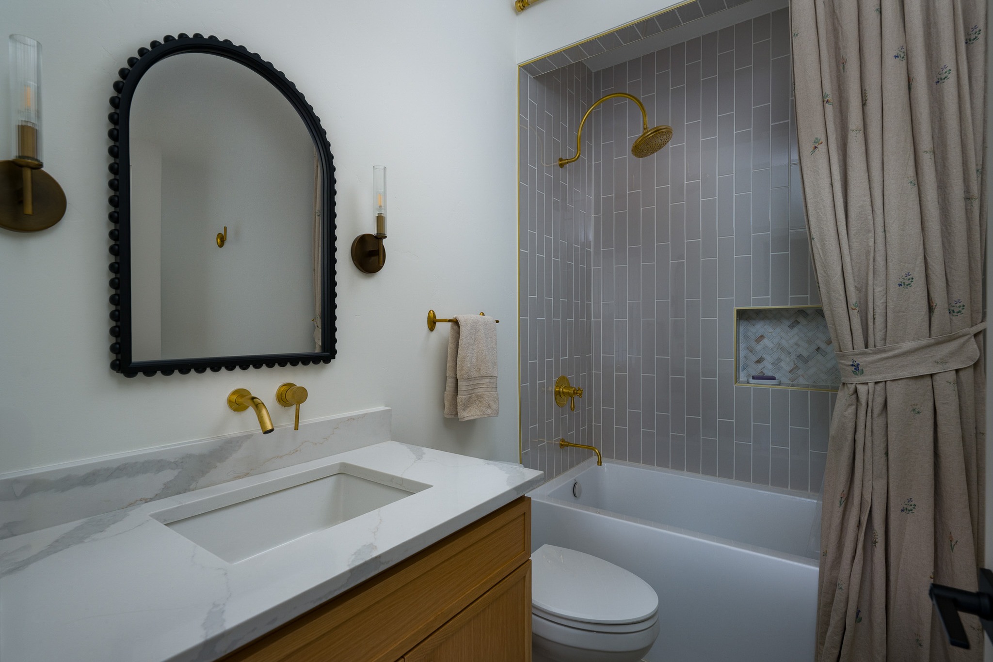 A bathroom doesn’t have to feel ordinary. This design pairs soft, understated tile with warm brass accents, a statement mirror, and a vintage-inspired shower curtain for a look that feels both refined and personal. It’s the thoughtful details that give a space its character.
📩 Have a unique space you’d like to showcase? Let’s create imagery that brings your design to life.
#InteriorPhotography #BathroomDesign #InteriorDesign #ArchitecturalPhotography #DesignDetails #ColoradoPhotographer @bwdconstruction