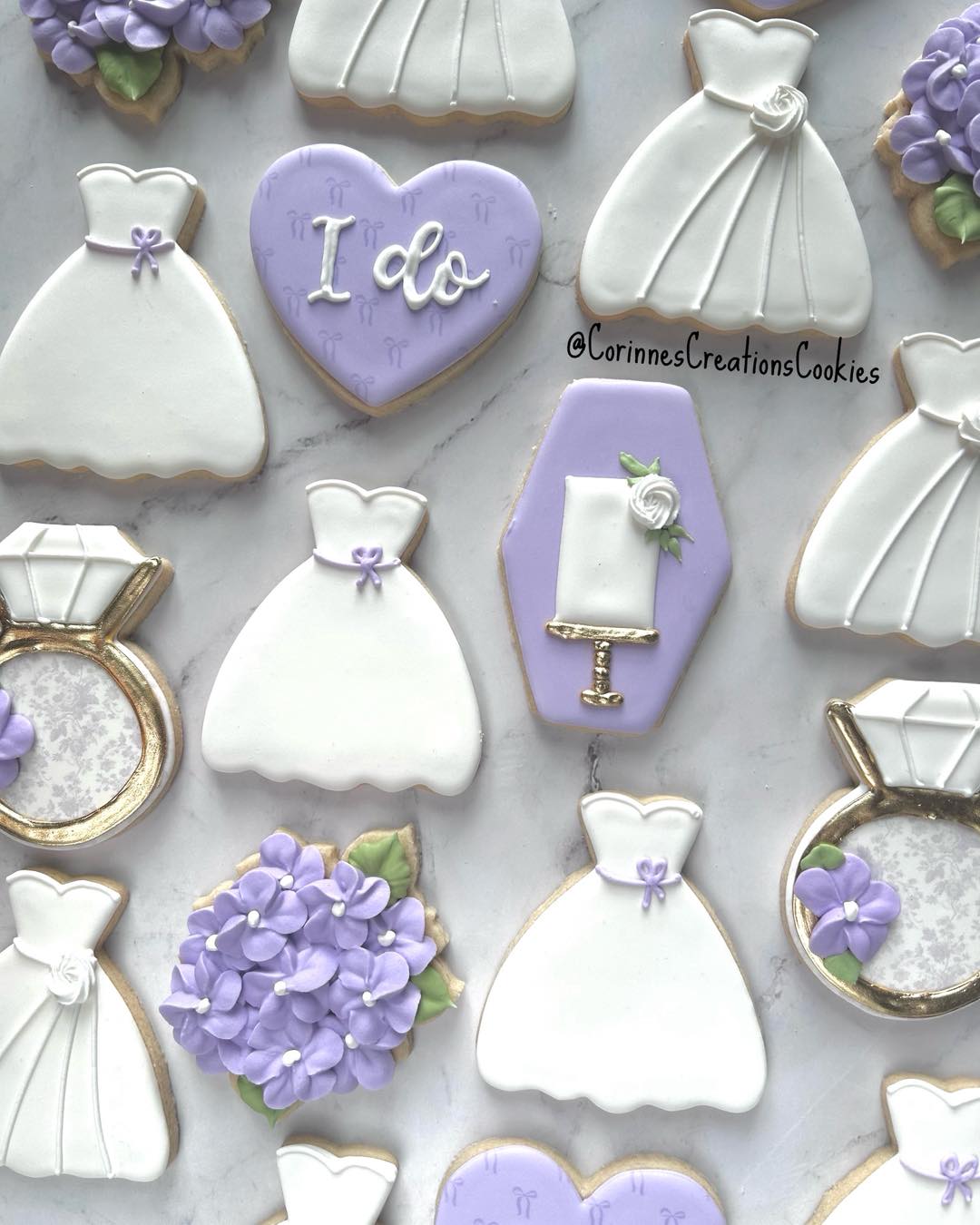 I love the lavender color in this bridal shower set. That cake cookie is one of my favorite designs to do.
.
.
.
#weddingdresscookie #weddingdresscookies #thewoodlandstxcookies #weddingshowercookies #bridalshower #wedding #sugarcookies #weddingshower #flowercookies #decoratedcookies #thewoodlandstx #customcookies