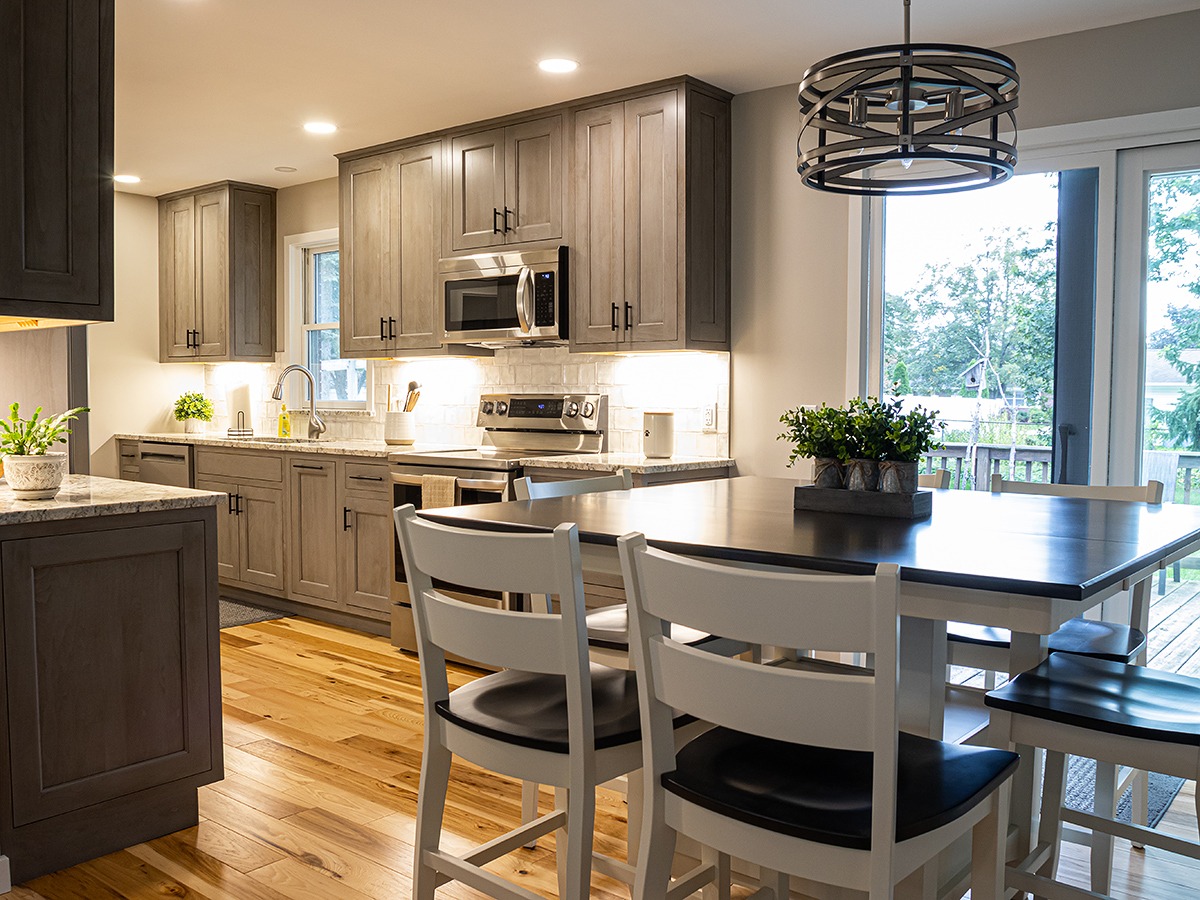 A new kitchen that is functional, open, and made for everyday living. Loving the warm wood floors paired with these deep gray cabinets. 🩶🤎
Michigan Contractor | Kitchen Renovation | Kitchen Remodel | Custom Remodel | Real Wood Florrs.
