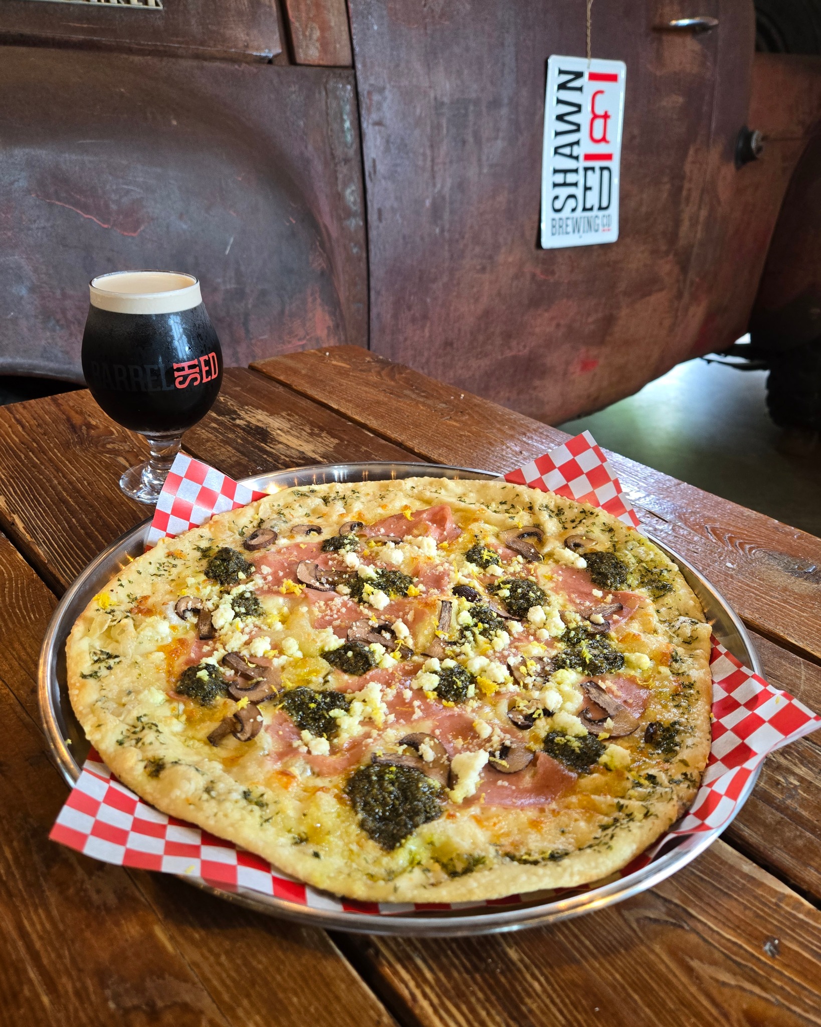 There’s a new crush at the SHED. 🍕🍺
This week’s kitchen feature is The Crusher Beer Pie. Garlic olive oil, a herbed parmesan crust, mozzarella, ricotta, mortadella and mushrooms, all finished with house pesto and a little lemon zest.
And because one crusher deserves another, we’re pairing it with our equally crushable Nitro Dark Ale. Exclusively available on tap at the SHED. 🍺
Head to the SHED and try The Crusher for yourself. You’ve got one week to get your hands on it. ⌛