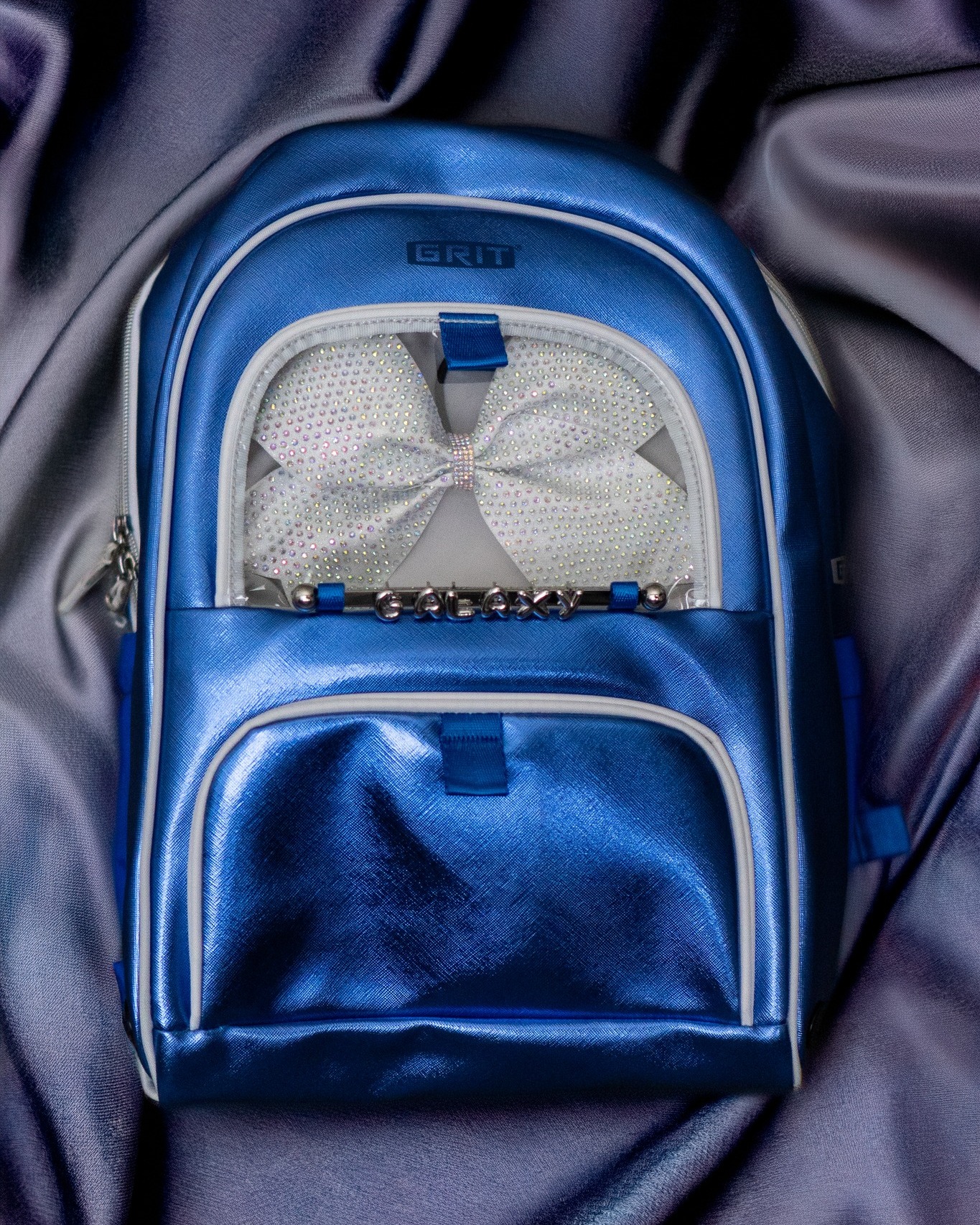 โจWant one of your own? Check out the link in our bioโจ
You may have seen a video or two, but here are the close up shots of our Season 6 GRIT cheer bags!! Our Worlds Team is going to be showing up and showing out in STYLE ๐
๐ผ๐ซ
The details of this bag are so beautiful with magnetic opening in the front (no more zippers snagging on shoelaces or bows) and a gorgeous display to rep your competition bow!
And we can't forget to mention the gorgeous letter charms ๐ญ
@dancewithgrit you have simply outdone yourselves with these ๐ค๐
#dancewithgrit #cheerbag #cheerleading #cheerlife