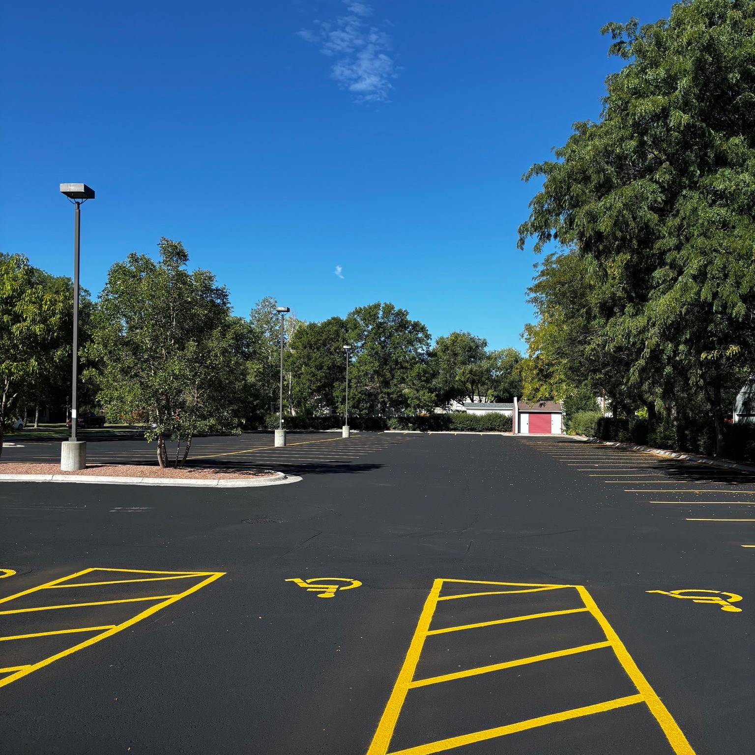 Our parking lot was refinished this week, and it looks amazing! Thanks for your patience with parking on the street this week while the work was going on!