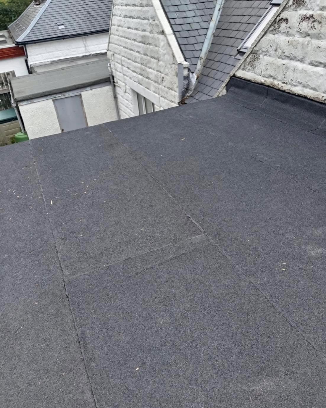 Felt overlay to flat roof area — Stirling