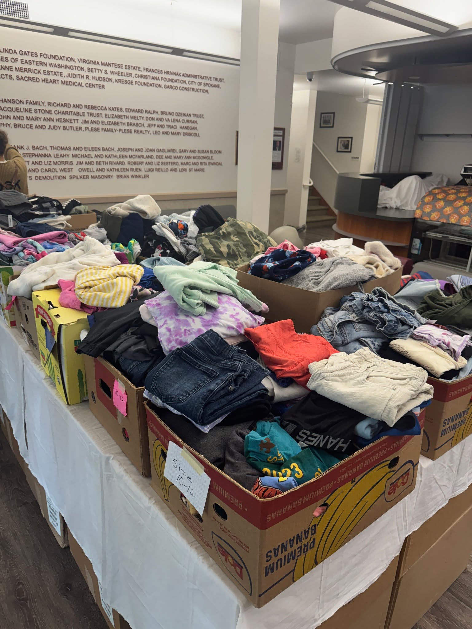 ‼️FREE Pop-Up Shop‼️
Thursday, September 10, 11 a.m.-4 p.m.
12 E 5th Ave in Spokane
We welcome the public to visit our Catholic Charities Pop Up Shop on Thursday, September 10 from 11 a.m.- 4 p.m. We have clothing, blankets, household items and more! This is open to everyone, including those impacted by the devastating fires in Eastern Washington.
We are overwhelmed by the outpouring of clothing donations for our brothers and sisters in need. To give our team time to process all of our current donations, we are still pausing accepting clothing donations. A big thank you to our community for your generosity during this time!