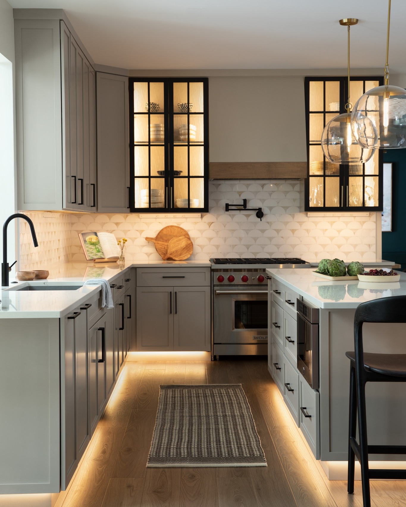 Same kitchen. Very different feeling.
Lighting is one of those design details you may not fully appreciate until you see what happens when it’s turned off.
In this kitchen, we didn’t rely on a few ceiling fixtures to do all the work. We layered lighting throughout the space—under the cabinetry, inside the glass-front cabinets, along the toe kicks, and with decorative pendants over the island.
Each layer has a purpose. Some makes the kitchen easier to work in. Some highlights the cabinetry and finishes. And some is simply there to create warmth and atmosphere.
The best part? You don’t necessarily notice all of the individual light sources.
You just notice that the room feels better.
Swipe to see the same kitchen without the accent lighting →
This is exactly why we think about lighting early. Whether we’re renovating or designing a new build. The prettiest fixtures in the world can’t make up for a lighting plan that wasn’t considered from the beginning.
Good lighting isn’t just about seeing the room. It’s about how you experience it.
#PittsburghInteriorDesigner #KitchenDesign