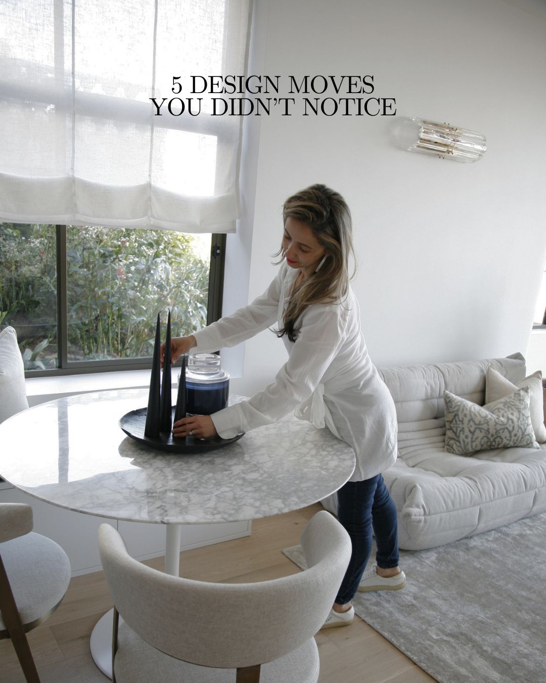 5 DESIGN MOVES YOU DIDN'T NOTICE
01 — THE FIRST THING YOU SEE
Visual hierarchy
Before you notice the furniture, your eye lands somewhere.
A designer deliberately creates a visual anchor.
A sculptural pendant, artwork, architectural opening, stone detail or view and positions everything else to support it.
02 — THE 50MM THAT CHANGES EVERYTHING
The space around the furniture
Sometimes the difference between a room feeling cramped and considered is only a few centimetres.
The clearance around a dining chair.
The space between a sofa and coffee table.
The width of a passage.
The distance between joinery and an island.
These measurements aren't noticed consciously but your body feels them.
03 — THE DETAIL THAT MAKES JOINERY DISAPPEAR
Repetition + alignment
Look closely at a beautifully resolved room.
Door lines align.
Joinery panels continue across walls.
Handles sit at a consistent height.
Stone veins are considered across junctions.
Switches don't interrupt the composition.
Nothing is shouting for attention.
04 — LIGHTING YOU DON'T NOTICE
Layers, not a single light source
The best lighting isn't necessarily the statement pendant.
It's the combination of ambient light, architectural lighting, task lighting and softer pools of illumination that allow a room to change throughout the day.
Morning.
Afternoon.
Evening.
The room should never feel like it has only one setting.
05 — THE VIEW FROM THE DOOR
Designing the experience, not just the room
One of the first things we consider isn't:
“What should go here?”
It's:
“What will you see when you walk in?”
Then we consider what happens next.
Where your eye travels.
How you move through the space.
What you discover.
Where you naturally pause.
And what you see from the places you spend the most time.
GOOD DESIGN ISN'T JUST WHAT YOU SEE.
IT'S WHAT YOU FEEL.
If you're planning a renovation, the best time to bring a designer in is when the decisions that shape the entire experience are still possible.