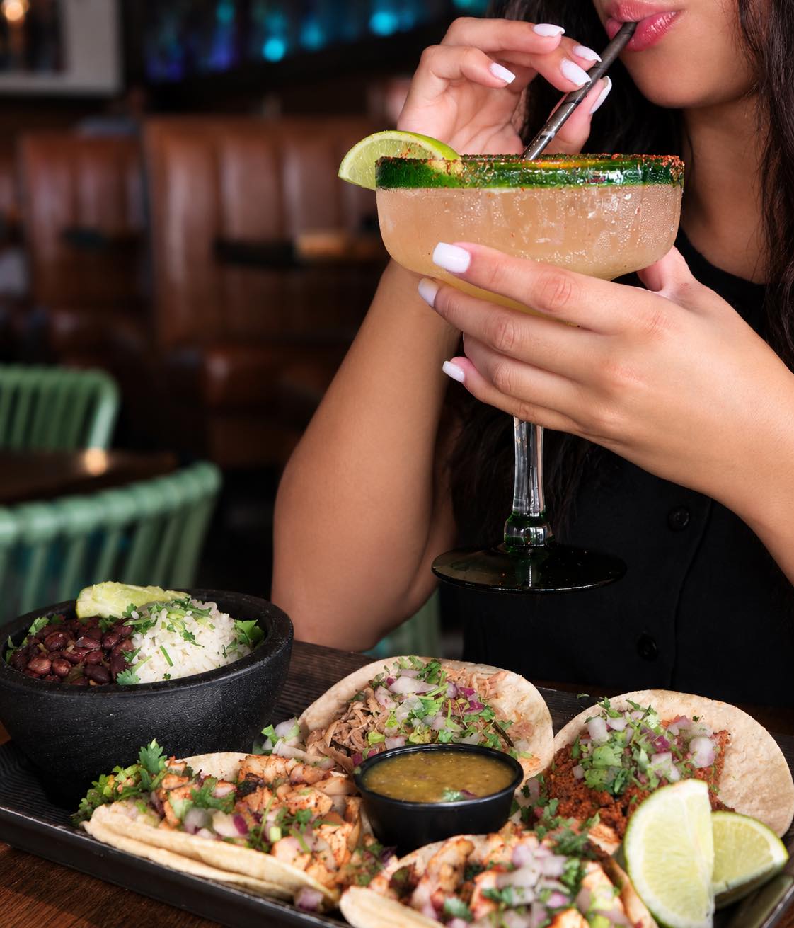 Tacos on the table, marg in hand. We’re good. 🌮🍹