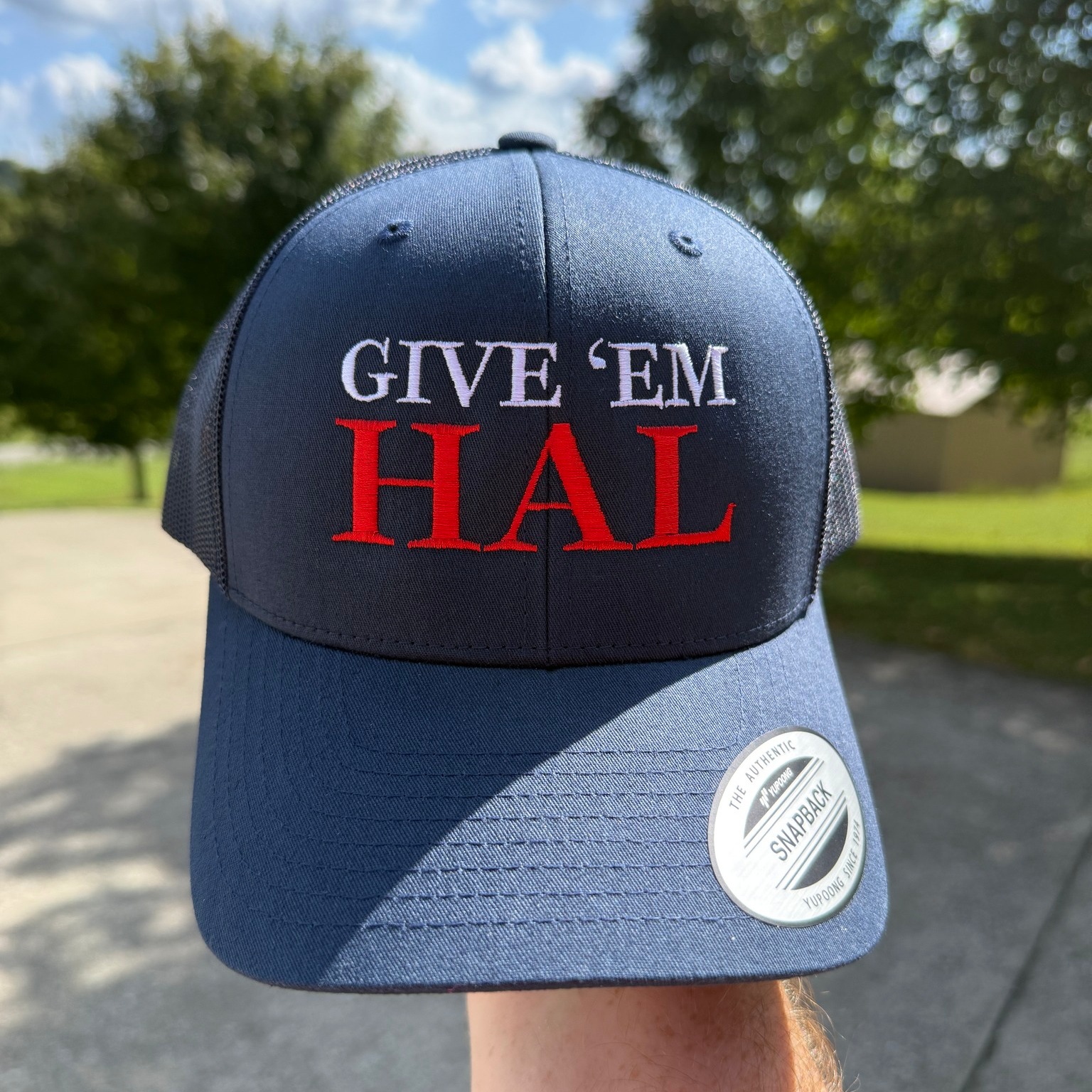 This will always be special - I was working on designs for the Congressman Hal Rogers campaign earlier this year and threw in "Give 'em Hal" for fun. And they liked it!
Not only that, their supporters have loved it too, asking for more merch like these hats and pins.