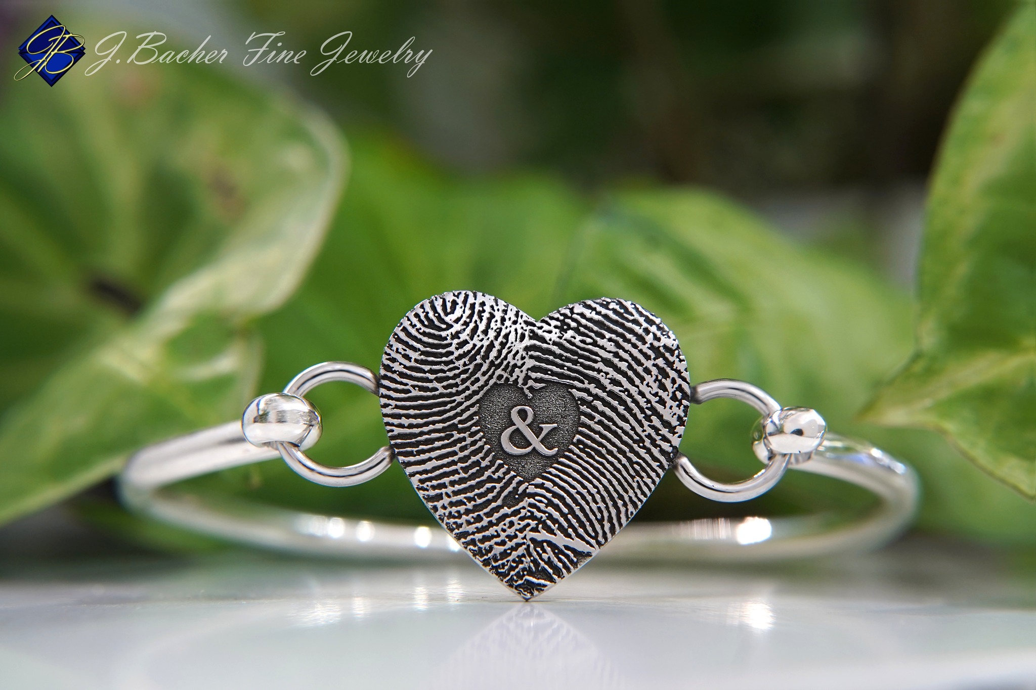 There’s something incredibly special about jewelry that could only belong to 𝐲𝐨𝐮. ❤️
This heart features the fingerprints of a husband and wife, intertwined together to create one incredibly special keepsake. A small piece of each other, carried with her wherever she goes.
Some jewelry is beautiful because of how it looks, and others are beautiful because of 𝒘𝒉𝒂𝒕 𝒕𝒉𝒆𝒚 𝒎𝒆𝒂𝒏.