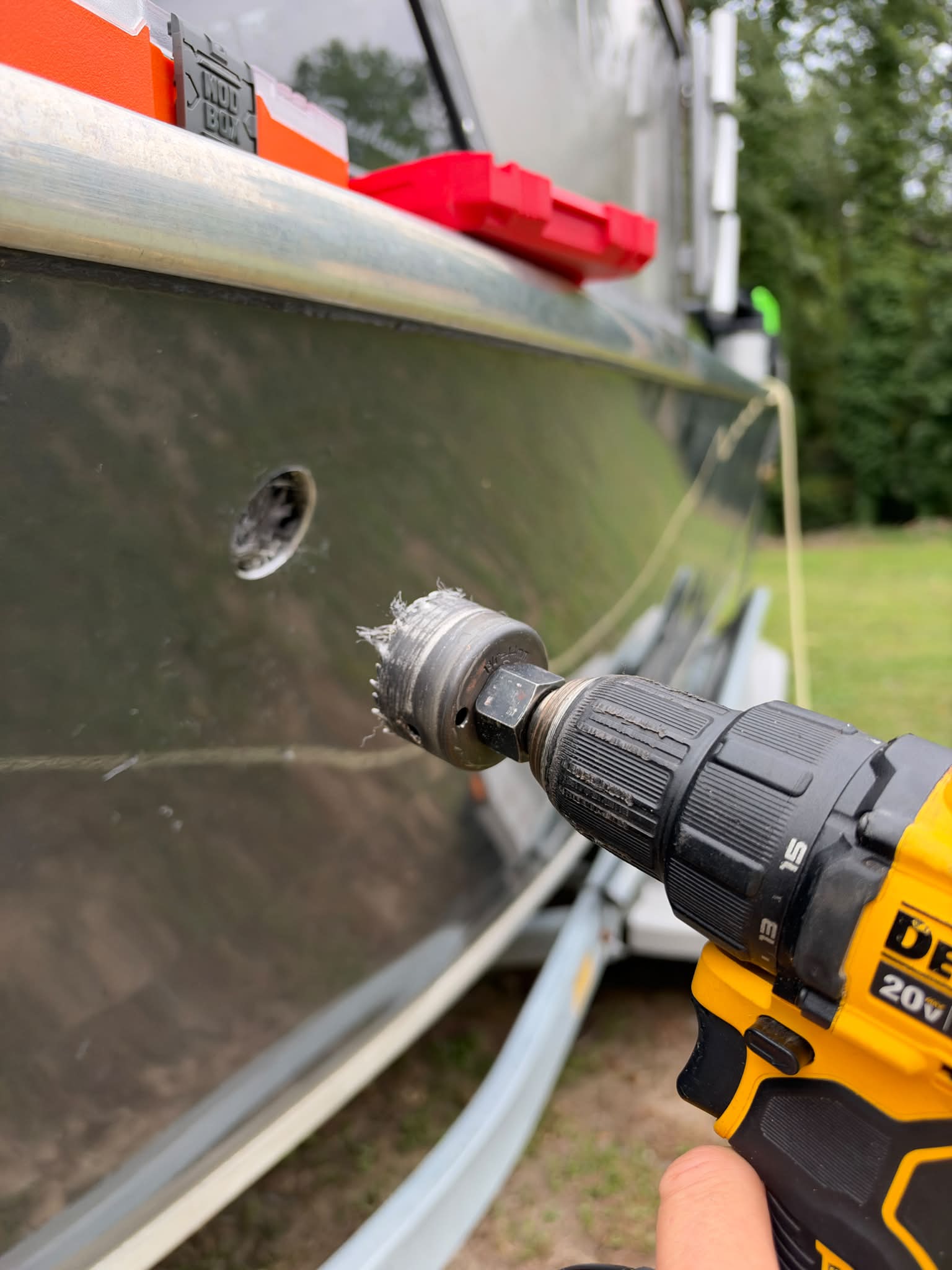 Who drills a hole in the side of a perfectly good boat?