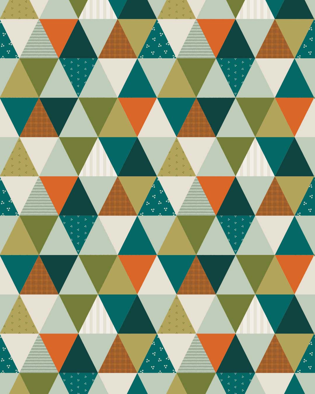 This design is my entry for the current Patchwork Revival Spoonflower competition.
Inspired by the patchwork quilts that become treasured family keepsakes, this geometric design brings a modern, playful spirit to the tradition. Triangles in blues, greens, and orange create the impression of pieced fabric blocks while simple patterns within them add a touch of the character and variation of collected textiles. The palette is inspired by the colours I used in my son’s nursery, giving the design a personal connection. Together, the colours and geometric shapes create a contemporary quilt-inspired pattern that feels both cheerful and timeless.