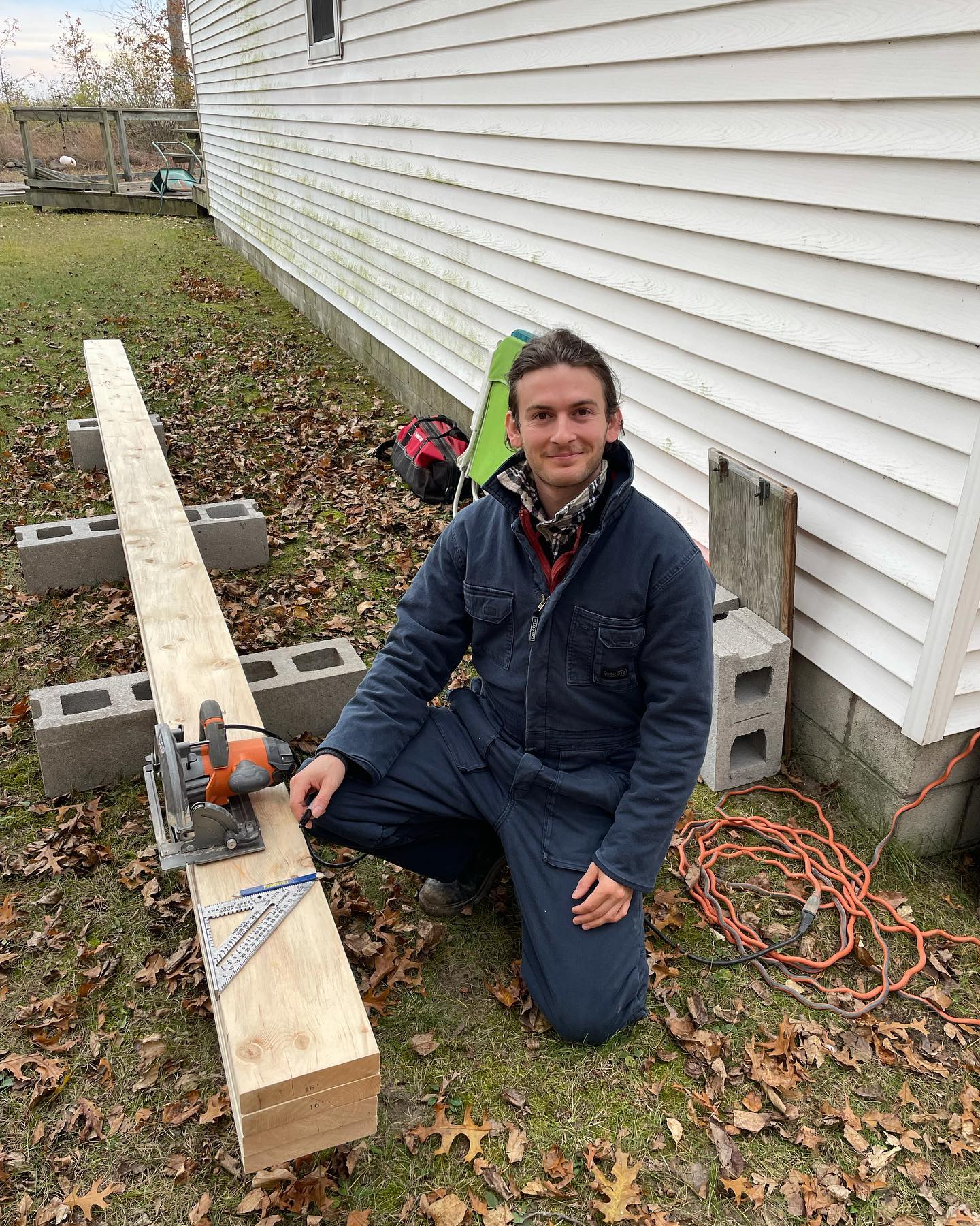 My assistant Q Cutting up some girders