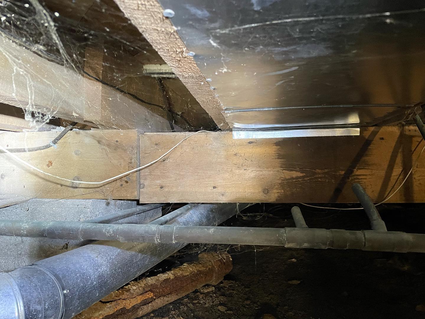 Our latest project in Wallaceburg has some sagging girders, it is a heavy home, but the girder wasn't assembled correctly... Pump never installed correctly either as you can see.... So sad. There are some rotted boards to replace. This home will need one large 4x3 cement pad and 2 smaller ones. About 30 bags of cement into a crawl space... It's going to be an exciting challenge!