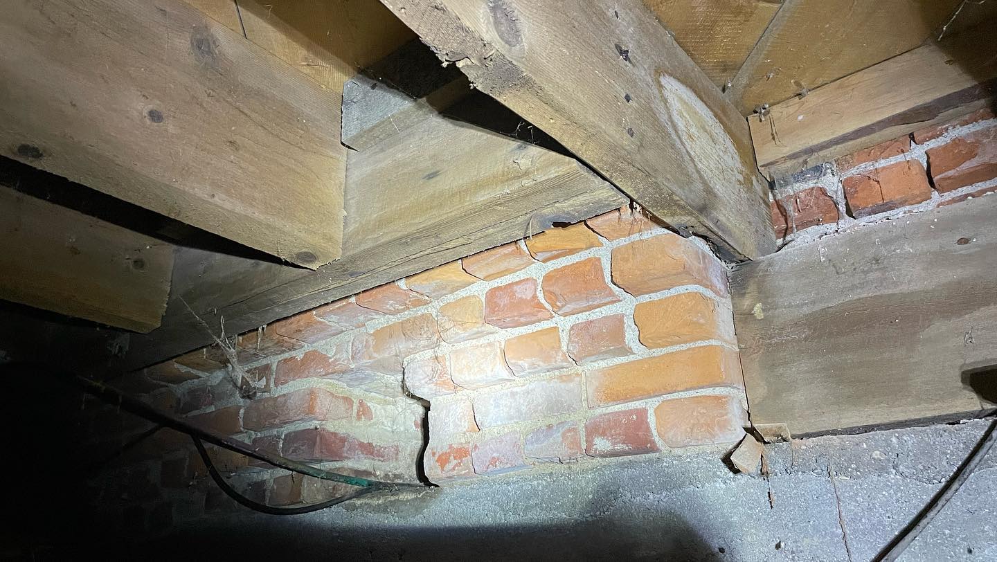 Before and after of that rotted floor under a fireplace.