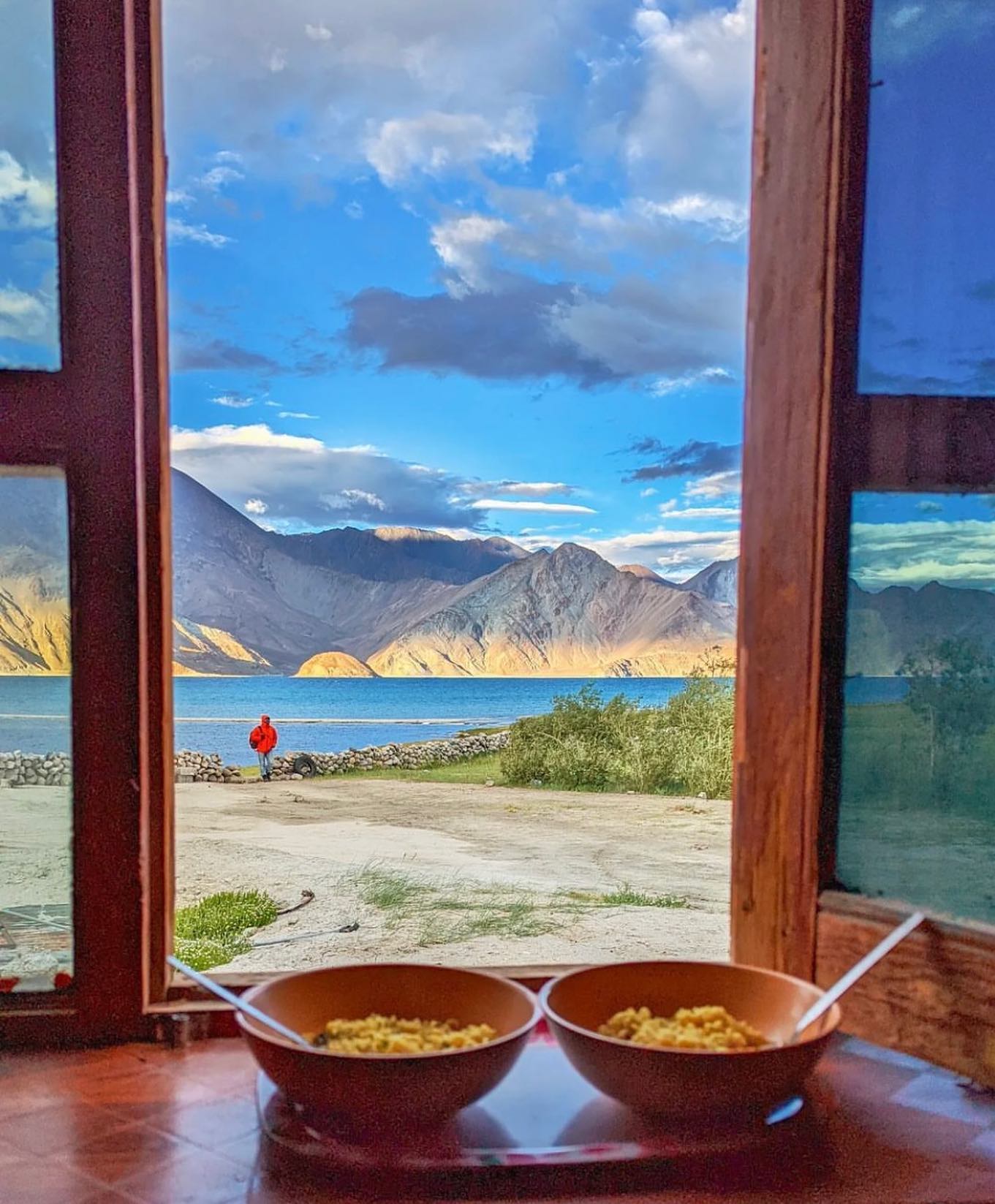 TRAVEL STORIES FROM LADAKH
.
.
"After a day of riding in rains through off-roads, stretches of loose gravel, water crossings and rough terrain, we finally reached Merak - a small and beautiful village lying on the banks of the picturesque Pangong Lake.
The stay at Merak was probably the homestay with the most beautiful view I have ever been too. We watch the beautiful Pangong lake change its shades and colors throughout the day right from the window of our rooms.”
.
.
Courtesy @theunrulytraveler 
#ladakhbackpackers #travelholic #nubravalley #backpacking #reels #trendingreels #lehladakh #backpackers #trending ##wanderlust #spiritualawakening #instagram #nikonindiaphotography #ladakh #likeforlikes #backpackertrails #ladakhdiaries #followforfollow #adventurelover #himalyandiaries #himalayas #ladakh2022 #incredibleindia #shotoniphone #travelphotography#incredibleindia #follow4followback #instalike #instagood #instamood