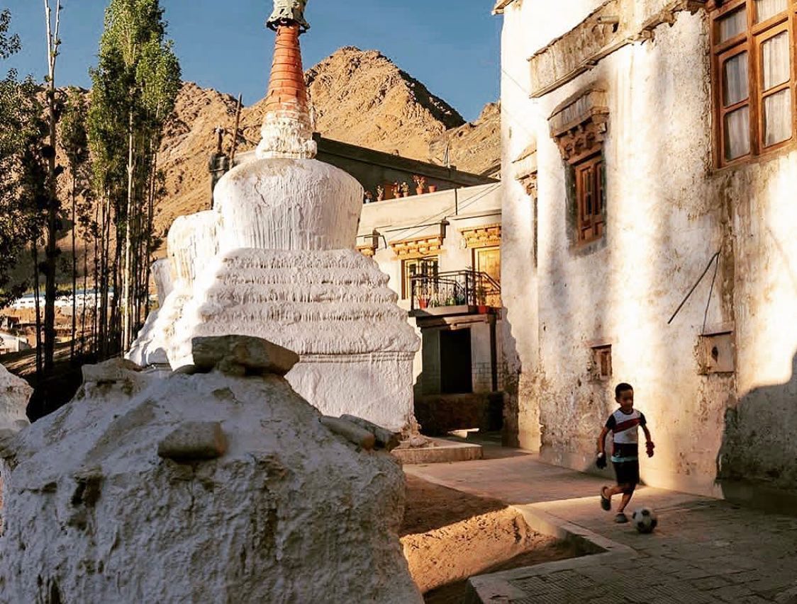 TRAVEL STORIES FROM LADAKH
.
.
"The FIFA World Cup fever. A young boy emulates his soccer heros as he weaves a line through his neighbourhood in the shadow of Leh Gompa, Ladakh.”
.
.
Courtesy @paulharrisphotography 
#ladakhbackpackers #travelholic #nubravalley #backpacking #reels #trendingreels #lehladakh #backpackers #trending ##wanderlust #spiritualawakening #instagram #nikonindiaphotography #ladakh #likeforlikes #ladakhdiaries #followforfollow #adventurelover #himalyandiaries #himalayas #ladakh2022 #incredibleindia #shotoniphone #travelphotography#incredibleindia #follow4followback #instalike #instagood #instamood #fifaworldcup2022