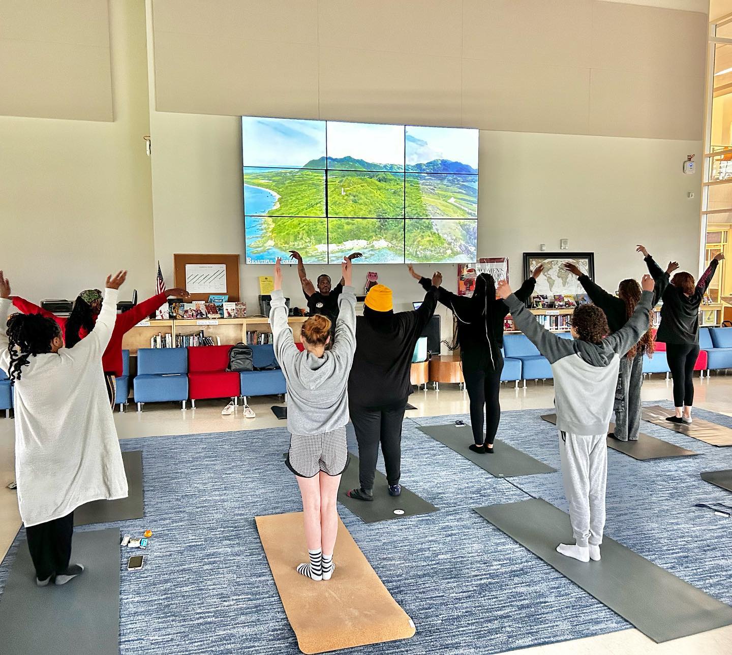 Yoga in the library was so fun! A great way to relax after ACT testing. Who is coming next time? #highschoollibrary