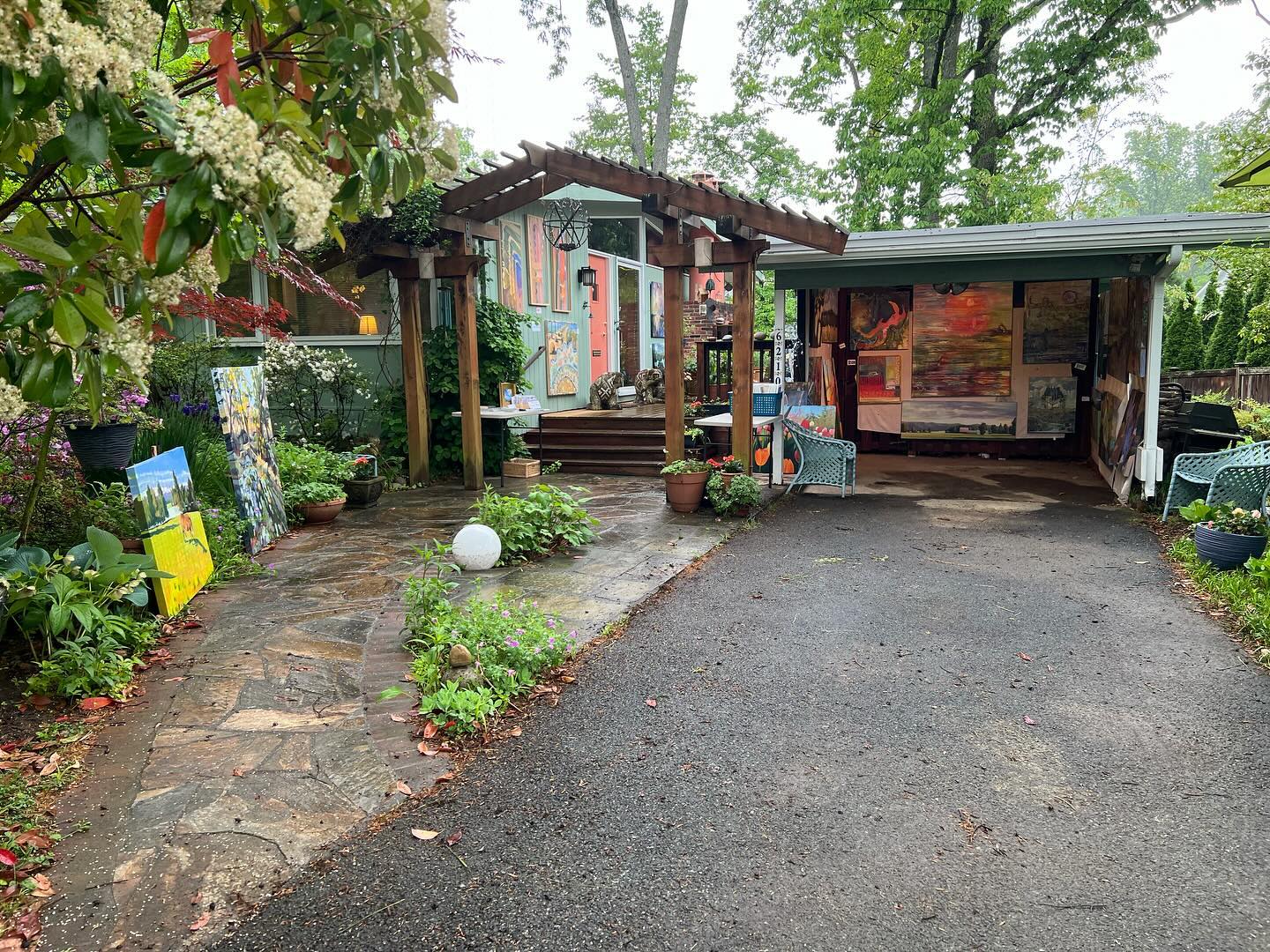 Art Walk today in the drizzle!  We stuffed paintings into the carport