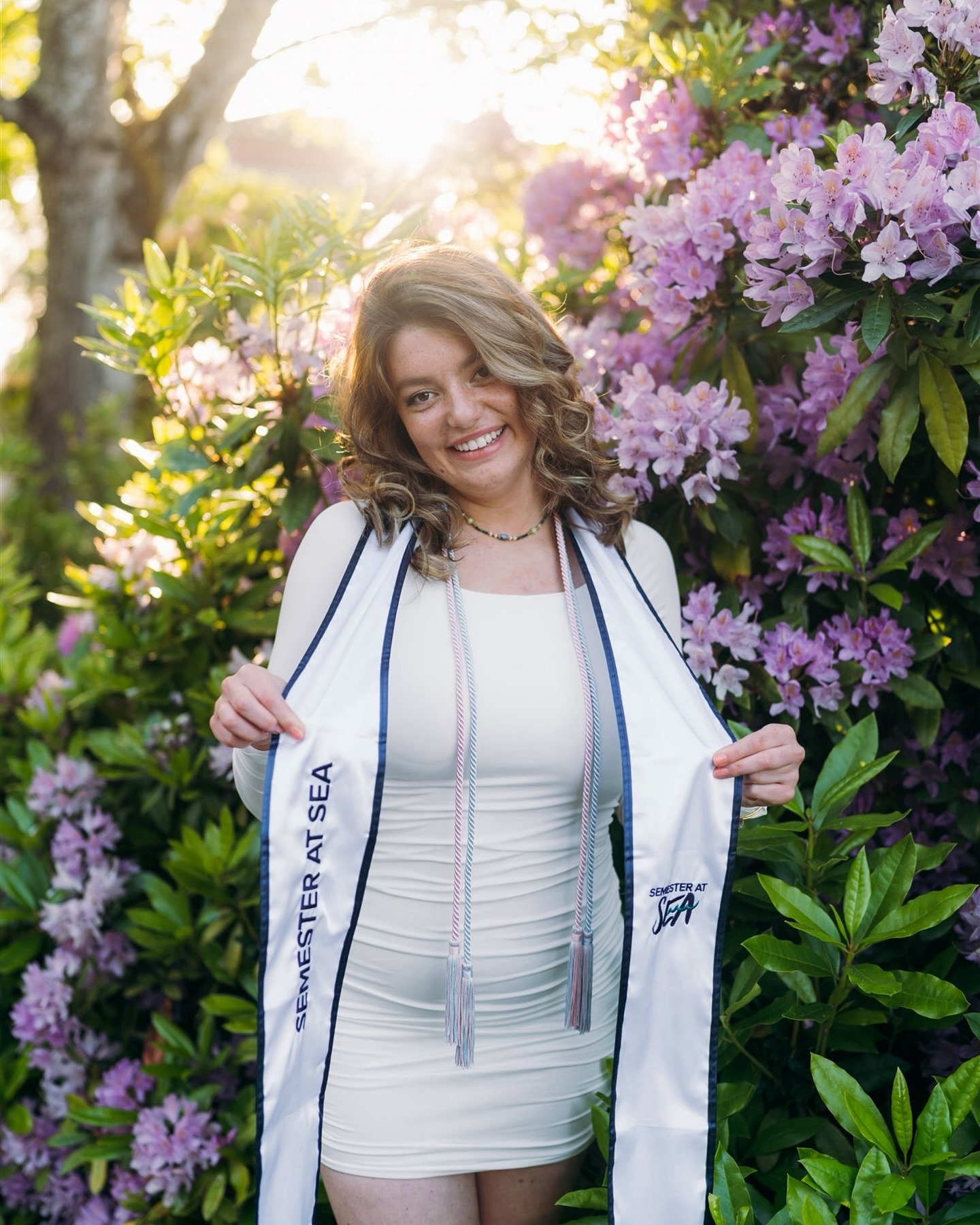 The height of grad season might’ve passed but there are still so many gorgeous photos to share. @maia.brown_ had so many cords that it was hard to keep track of what they were all for hahaha. Coolest part was her regalia from @semesteratsea, one of her favorite parts of her college experience. Love seeing these special parts of people’s lives shine through in their photos😌