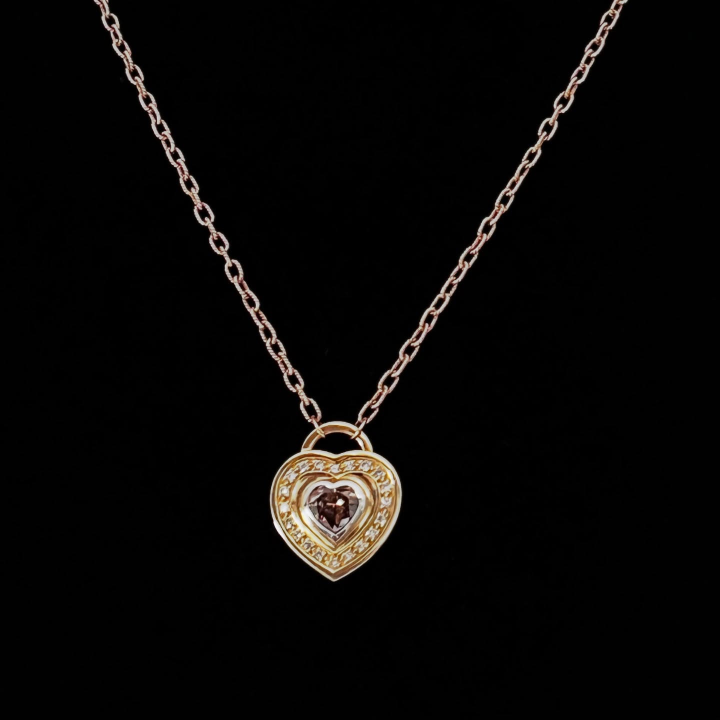 Stittgen hand made 18k gold pendant with a 1.97 carat fancy deep brown heart shaped diamond in the centre surrounded by 20 round brilliant cuts.
#stittgenjewelery#18kgoldpendant#browndiamond#diamonds #gold#gifts#christmas#beautifulgems #jewels