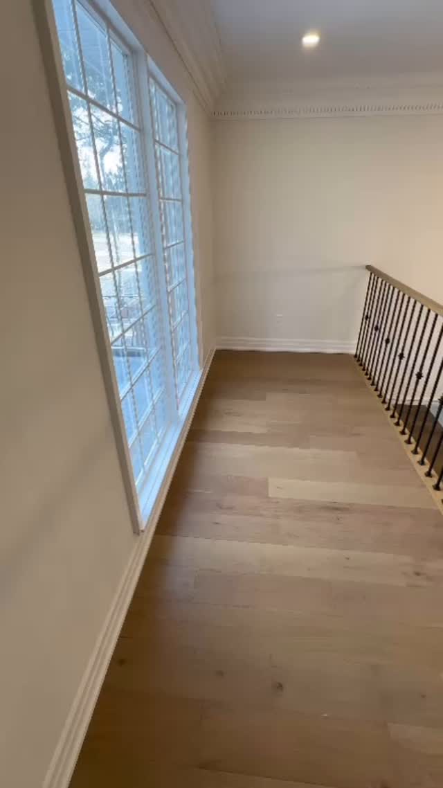 Transforming spaces with this stunning new stairwell, sleek railing, and a one-of-a-kind chandelier ✨ What do you think of these gorgeous hardwood floors? They bring a fresh, airy vibe to the home while staying low-maintenance – no more worrying about dirt or dust! #HomeDesign #FloorGoals #InteriorInspo