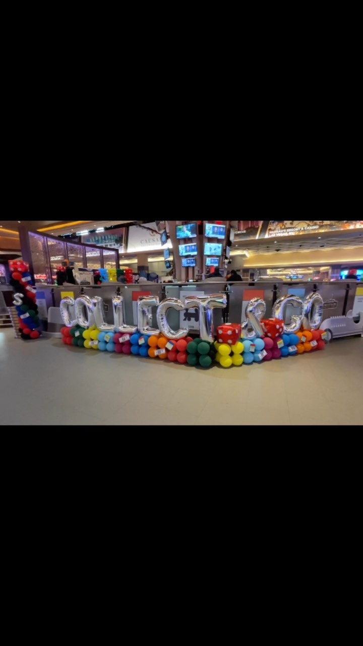 2- 8x10 balloon walls, 20 ft balloon marquee spelling out “collect & go”, and 6 balloon columns!