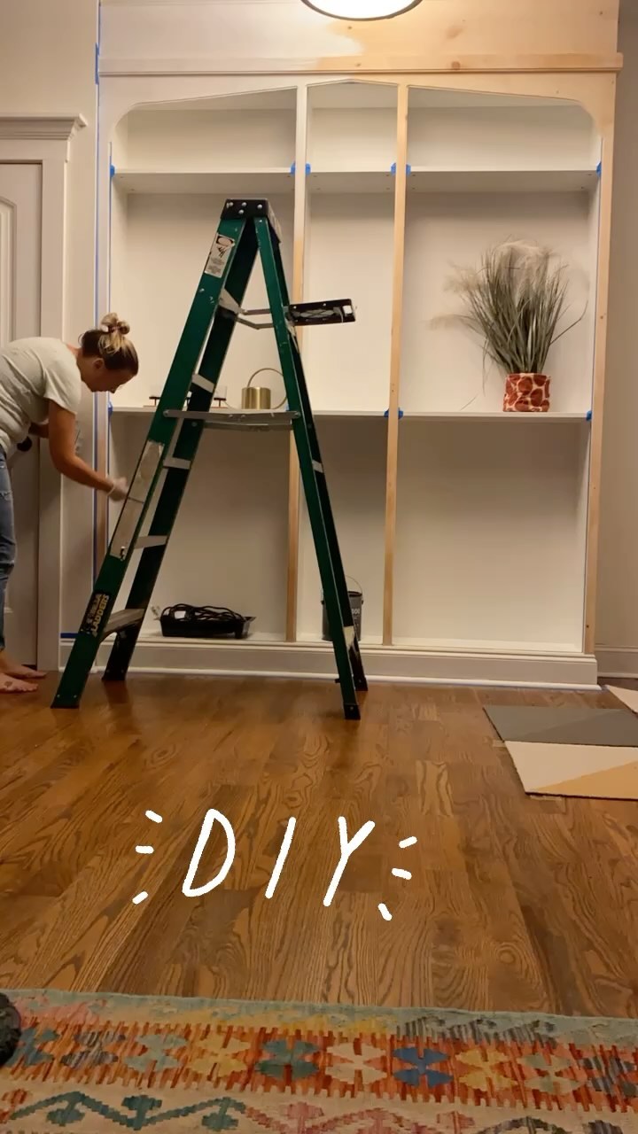 Priming the IKEA Hack we’re finishing up… after dinner so I had some helpers pop in and help, supervise. Oh and wipe up the blob of paint I dropped! #diyprojects #ikeahack #builtins #bohodecor #librarydesign