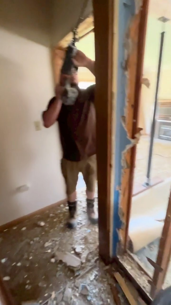 Loadbaring wall removal and a beam installation.