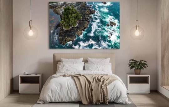 My favourite days on the west coast are the dark stormy days of winter. In this photo, an ancient stand of old-growth trees clings to a rugged rocky island. I took this photograph from about 100 meters up in the air out over the pacific ocean off the west coast of Vancouver Island in BC Canada. In January when this photo was taken the colours of the ocean are spectacular. During the winter months, the water is clear and the different shades of blue and green are vibrant on an overcast day.
The power of the ocean during the winter months is a truly humbling force to witness. Giant waves pound the rocky shoreline and relentless wind whistles through the ancient trees.
I often capture photos like these during breaks in the rain because its almost constantly raining during the winter months.