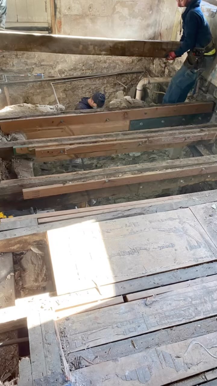 Late 1700s home structurally sound ✅.
•Fixed the rotted joists in the basement with full span LVL sisters
•Put a scratch coat on the walls in the basement to help strengthen the mortar joints on the original stone foundation wall.
•rebuilt the kitchen floor, and the whole second floor.
•reinforced the hearth under the fireplace with steel, and masonary
•poured elevated concrete footings to keep moisture off the bottom of our steel posts for rust protection.
•primed and painted all steel posts
•installed steel I beams
•installed custom fabricated steel posts
•jacked the floors back up as close as possible to level
•reinforced all mortise and tendon joist/header connections with steel angles and joist hangers.
Stick around for the end of the video to get a glimpse of our welder!
#structuralengineering #structuralsteel #laminatedveneerlumber #philadelphia #montgomerycounty #buckscounty #structuralcontractor