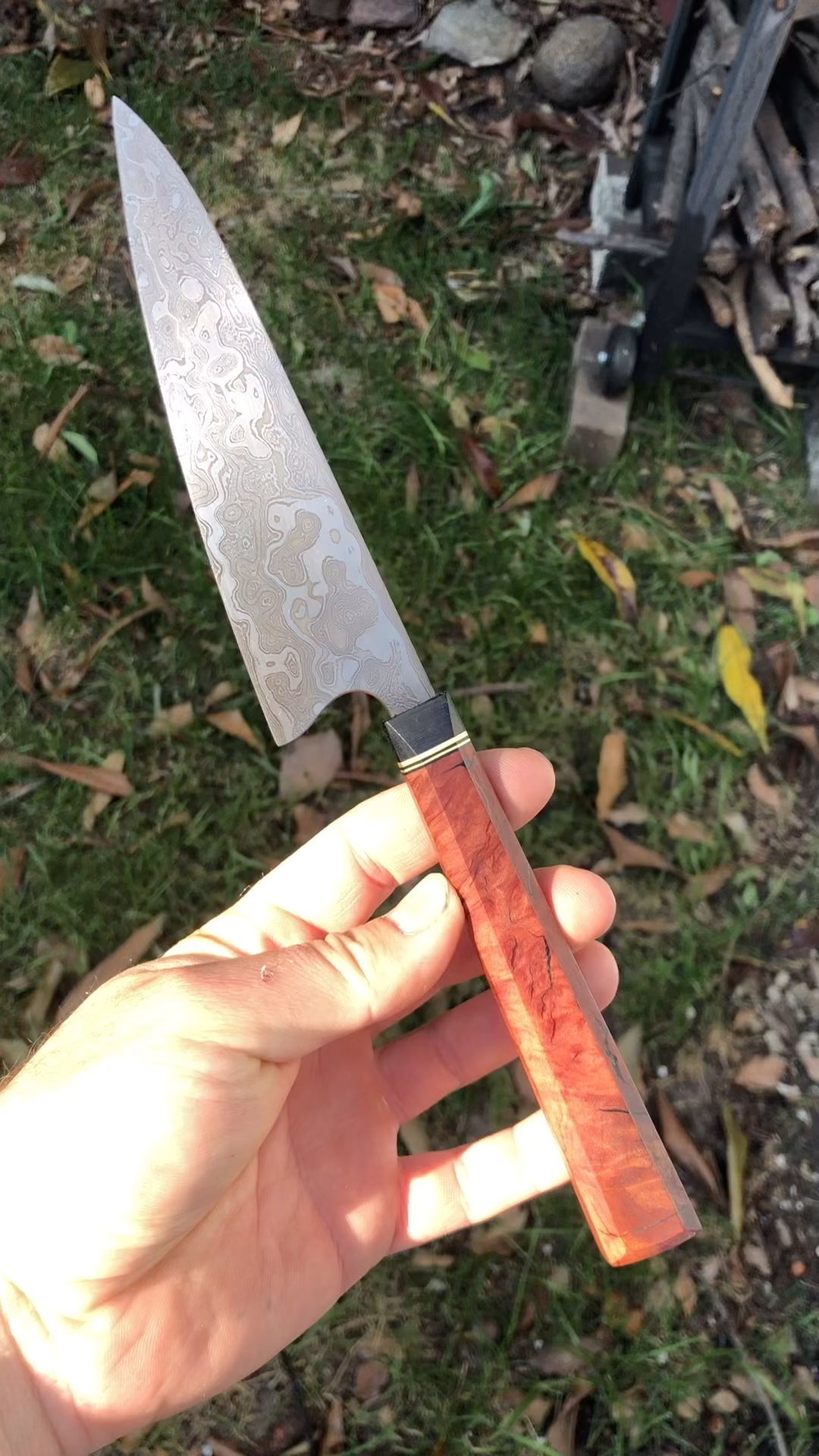 240 layer random pattern Damascus 15n20 and 1084
Red Malle, micarta, and brass handle
