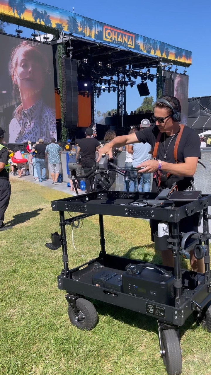 🎬
A little BTS from @theohanafest 2022.
Doing a quick @tiffencompany filter swap and prepping on the trusty @inovativ Voyager EVO 42 cart. We do on average 15,000 steps on a festival day, so having the cart to wheel all the drone gear around makes life a whole lot easier!
.
🎥 @kapturedm
•
#ohanafest #dronegear #tiffen #inovativ #dronelife #setlife #music #festival #socal #california #bts #drone #dji #aerial #cinematography #photography
