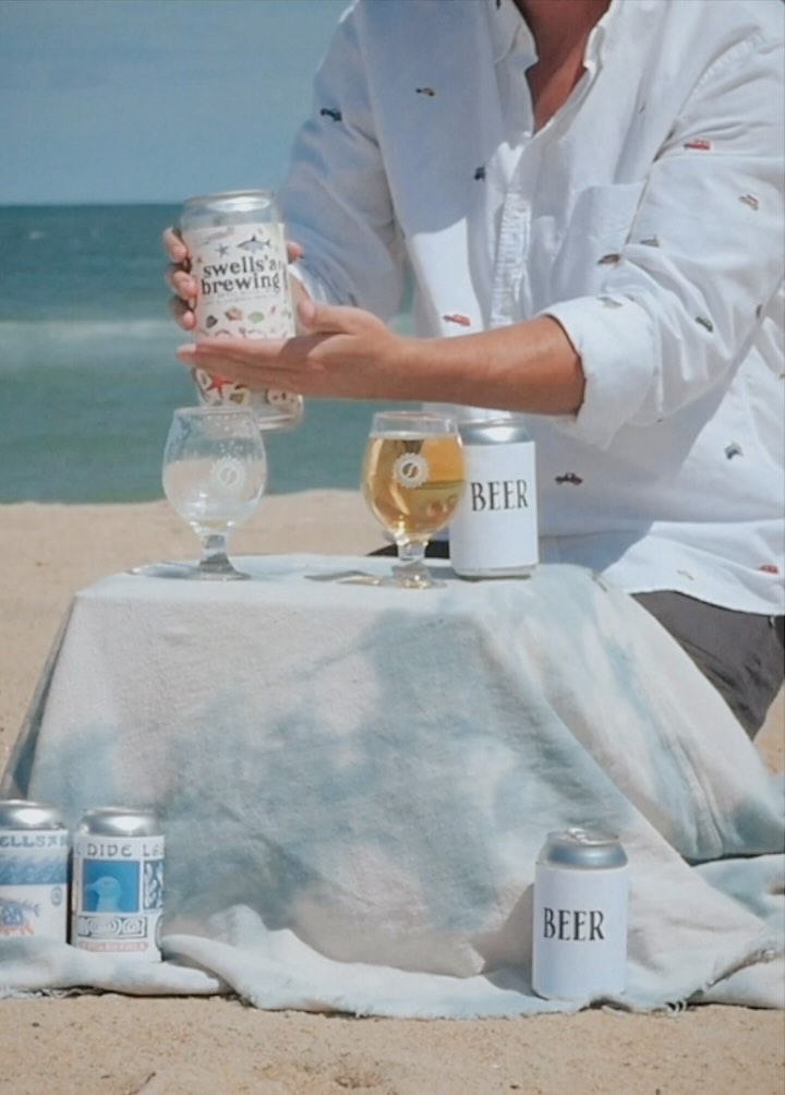 have you ever sat and wondered what makes a beach beer truly a beach beer? Is it just any old beer lugged alongside surfboards and a sun-bleached umbrella? Maybe it’s those waterlogged sandals & well-worn cap that seal the deal. One thing’s for sure - our beers are brewed here daily 100 feet from those crashing waves, with a salty breeze as their muse. Grab a six-pack, or even a crowler of our Swells’a beercraft, pull up a chair & sip away facing east with the wind tossing through those salty locks. and when you’re done, hold that empty can to your ear - you can almost hear that sea breeze & squawking seagulls fading in the distance. After all, that’s what these beers call home. 🌊🐬🍻🍍🌴🌞 .
.
.
.
.
#swellsabrewing #ncbeer #obxbeer #outerbanksbrewery #ncbrewery #obxbrewery #localbeer #killdevilhills #outerbanks #nccraftbeer #duckdive #ducknc #drinkcraftbeer #drinklocal #obx #boatbeers #ncbrewery #hops #duckdivelager #jimmybuffett #6pack #sixpack #beer #outerbanksbeaches #beer #surftrek #beer #crowlers
#obxbeer #outerbanksbeer
