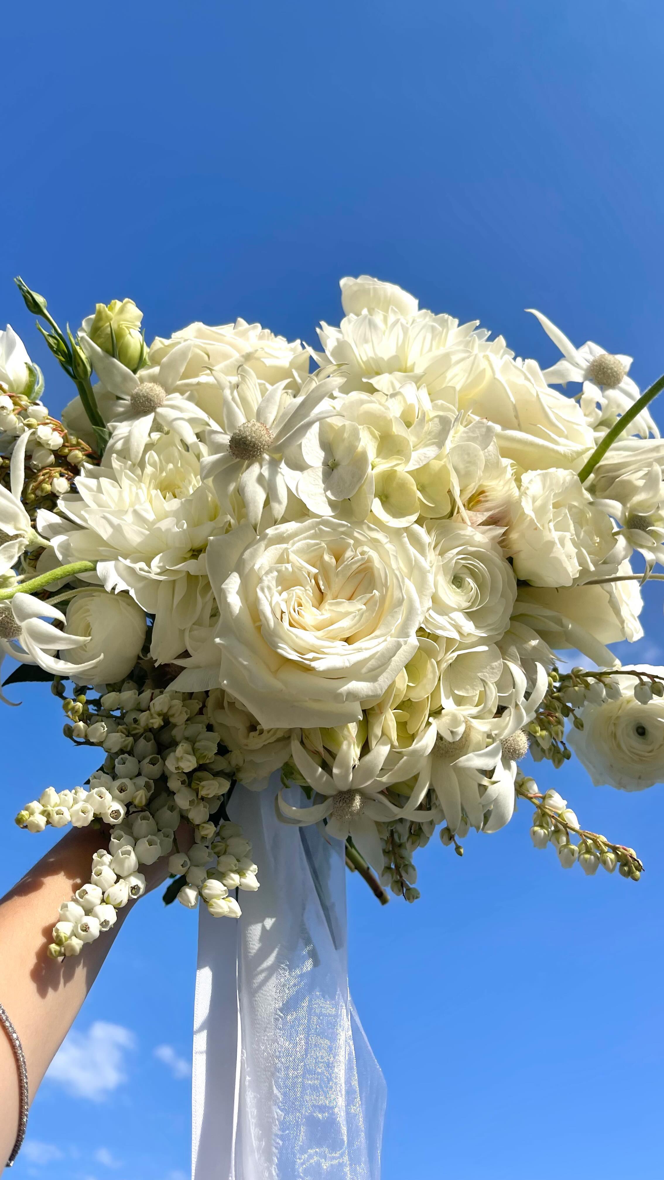 We’re clearly 🤍ing white wedding florals this spring 🕊️🦢