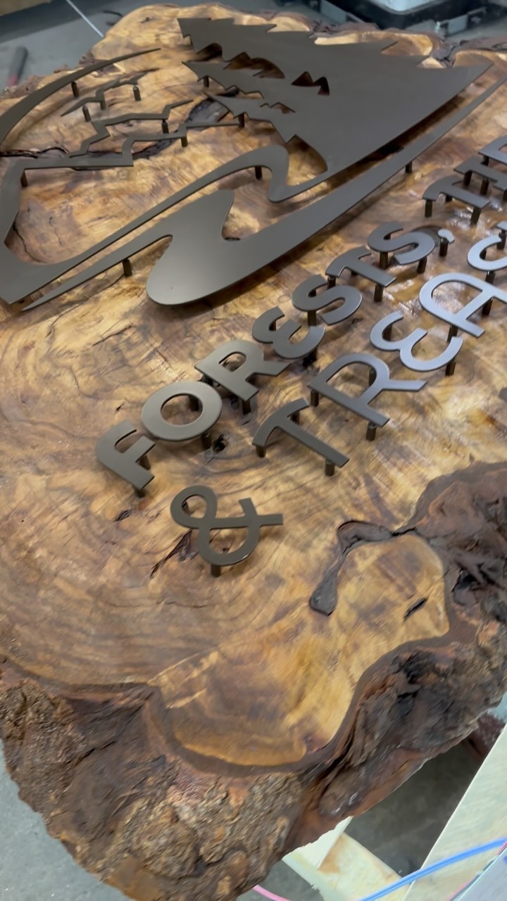If you visit @foreststidesandtreasures in Seward, AK this summer, you will see this beautiful new sign over their front door! A huge thank you to @eagleriversawmill and @Glacier.Sign.and.Lighting for their craftsmanship and collaboration with us on this fun project!