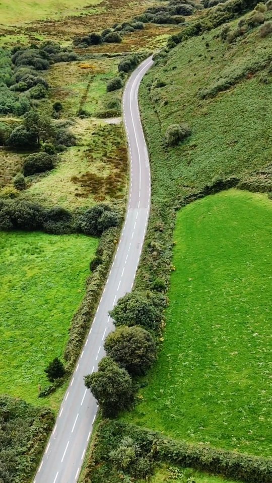 There’s a magic in the roads that stretch across Ireland, where the landscape shifts between rugged cliffs and endless green fields. A few days ago, we set out from Doolin to Dingle, tracing the winding roads that cut through the lush countryside. From above, the fields are divided like a patchwork quilt—vibrant shades of green as far as the eye can see. Somewhere in the middle, a quiet road carves its way through the landscape, with just enough traffic to remind you that you’re not alone, but still part of something wild and untouched.
We stopped at Inch Beach along the way, but it’s the journey through these fields that stays with you—the feeling that this land holds stories in every stone, every curve in the road. It’s a kind of beauty that’s both simple and profound, a reminder of why Ireland captures the heart.
#ireland #dji #IrelandRoadTrip #GreenFieldsOfIreland #MagicOfTheRoad #WildAtlanticWay #InchBeachStop #IrelandFromAbove #LushLandscapes #travel