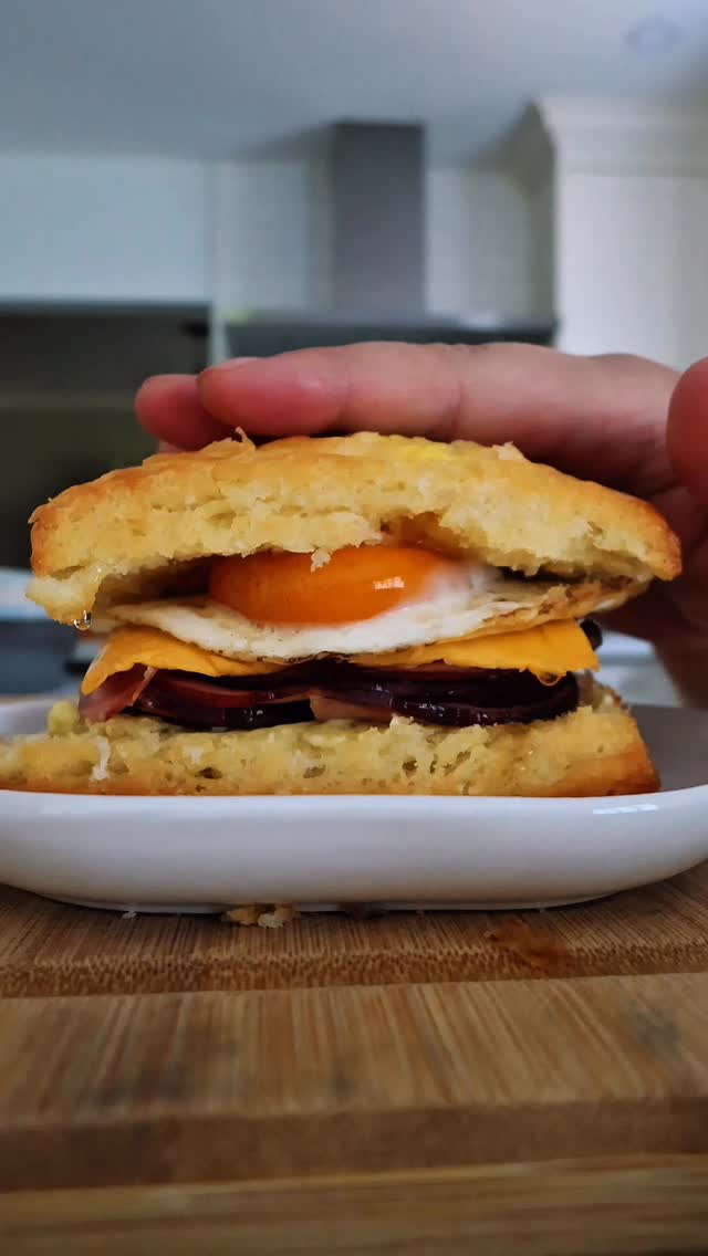 Hey Burnt Out Besties! This is officially Day 2 of my National Sandwich Month series. This ham & egg biscuit sandwich is the reason I get out of bed.
Adopted Korean “Son” & Husband Approved.
Buttery layers. Crispy ham. A perfectly fried egg.
Come back tomorrow for the next build 👇
#NationalSandwichMonth #HamAndEggBiscuit #BreakfastSandwich #FoodieShorts