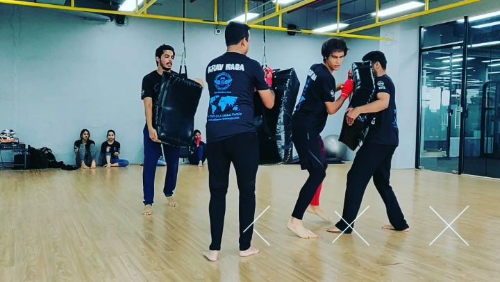 "Krav Maga heightens perception and transforms fear into something productive"
- Imi Lichtenfeld, Founder of Krav Maga
Training Krav Maga means learning to deal with multiple threats from Class 1.
Here are some students from the Beginner batch doing bag work simulating a multiple attacker scenario. The goal was to survive for a minute of hitting the pads continuously and not run away. This is a test of stamina, explosiveness and striking technique.
A minute may sound like a short amount of time but considering this was the end of a long 2 hour class, the students performed quite admirably.
Come join us for a power packed class at one of our many centers across Pune
Instructor: @solidshieldcombatfitness
Venue: @evolvefitnessandwellnessclub
@vickykapur_s
@happiness_inc_pune
@krav_maga__ultimate_ #kravmaga #kravfamily #kravmagaindia
#ultimatekravmaga #selfdefense
#selfdefenseforwomen #fitness #kickboxing #mma #stamina #endurance #explosive #strikes #kicks #punches
#selfdefenseinindia #martialarts #iukmf #shtrunashak #indianmilitary #womenselfdefense #pune #maharashtra #kravmagaindia