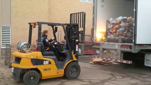 Loading up Turkeys to go to the Food Depot Alimentaire. That's a lot of turkeys!!