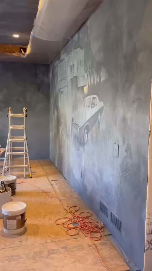 This moody mural was completed for a Sheetz office as an homage to the original store location in central PA (complete with the first manager’s ‘68 Chevy Impala that was always parked out front!)
Zack started with big, brushy marks that dissolved into imagery that appears to be emerging from the scene. Plaster surrounded the mural to seamlessly integrate it into the space.
Bird Studio is adept at combining muralwork and decorative plaster to create a seamless unified atmosphere for any design. Have a project in mind? Give us a call!
#featurewall #featurewalls #accentwall #accentwallideas #texture #interiorinspo #moderninteriors #muralwall #wallpaper #wallpapermural #interiormural #wallpaperdesign #ihavethisthingwithwalls #alwayshandpaint #muralpainting #paintedwalls #mural #plastering #plasterart #finefinish #limewash #plasterwalls