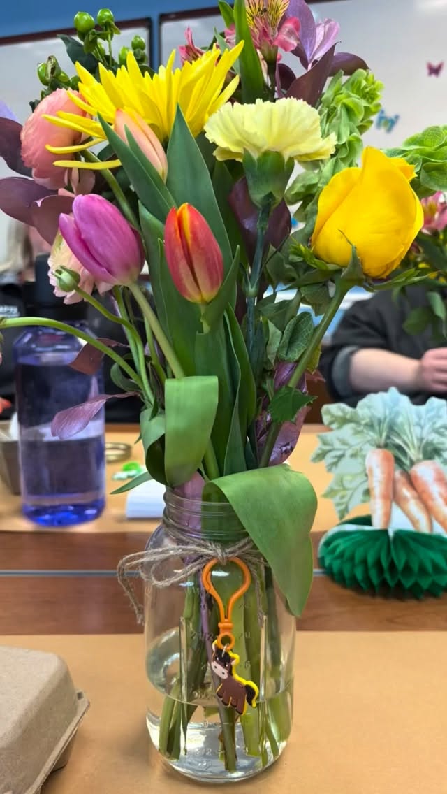 Farmer’s Market and Flower Bar Spring Fling
Who says you can’t make work fun?! Thursday, I got to host a little culture building event with our central office staff before our monthly status meeting and training/workshop! I sent them all to our “farmer’s market” where they got to “shop” for fresh fruits and veggies, Meemaw’s cookies, farm fresh “Easter eggs” with a hidden peep inside one of the eggs in their cartons, seeds to start their own gardens, farm animals to adopt from our “pen” (the cutest little farm animal keychains) and warm doughnuts.
Then they all grabbed a mason jar vase and picked their stems to create beautiful blooming bouquets of flowers to brighten their office and homes! We celebrated teamwork, accomplishments from the quarter, and then headed into our status meeting and monthly workshop!
#hosting #eventplanning #partysetup #decor
