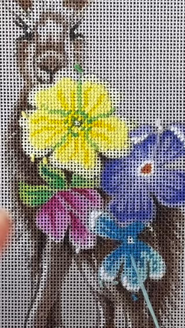 Who loves the early flowers of Spring? My pretty Hare is adorned with mauve violets, yellow primroses, pink walnut blossom and purple periwinkle. She will be available to stitch from my new website very soon #nicolajarvisstudio #thehandpaints #needlepoint