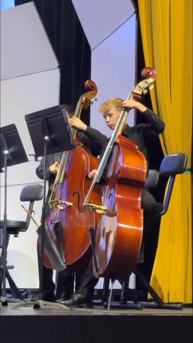 Last concert of the season. 2 years violin and 2 years bass under his belt.