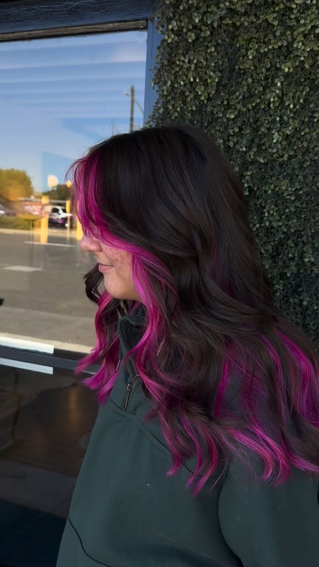 Pink has definitely been having a moment lately at 1322 and @ivannadoesthat is enjoying it.
When you’re ready for something expressive, and a little unexpected, a custom vivid color can completely change how you feel about your hair. It can also be done with more natural tones.
For this summer transformation, Ivanna created a soft pink glow by strategically lightening the perimeter and select pieces throughout the hair before layering the pink tone. The process takes time but the result is worth it.
The best part? This guest needed a look that worked for summer and school. When it’s time to head back to class, the pink can be covered and transitioned into a more natural look.
Temporary fun. Long-term flexibility.
Cooler water washing, bathed and protected with Kerastase Chroma protective line to keep it vibrant until the school bell rings. 🔔
