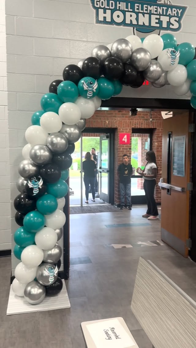 Gold Hill Elementary fifth grade graduation was such a fun one! 🎓✨ We set up a school-themed photo moment with our checkered shimmer wall + arch panel backdrop, then inside we did our classic arch with custom foam Hornet cutouts and fun columns throughout!
And of course, congratulations to my Bestie (niece), Natalie! I’m so proud of her accomplishments. Shout out to Miss Miller for being instrumental in Natalie’s growth this past year and to all of the staff for being so wonderful!
Seeing the line waiting to take pictures in front of our backdrops is so humbling, and just shows how interactive and memory-making these celebrations can be! Congratulations to all the graduates! 👏✨