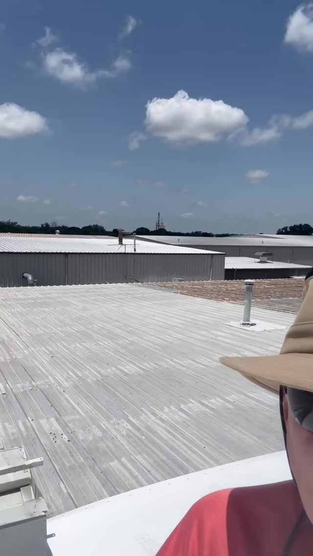 Retrofit metal roof with TPO.