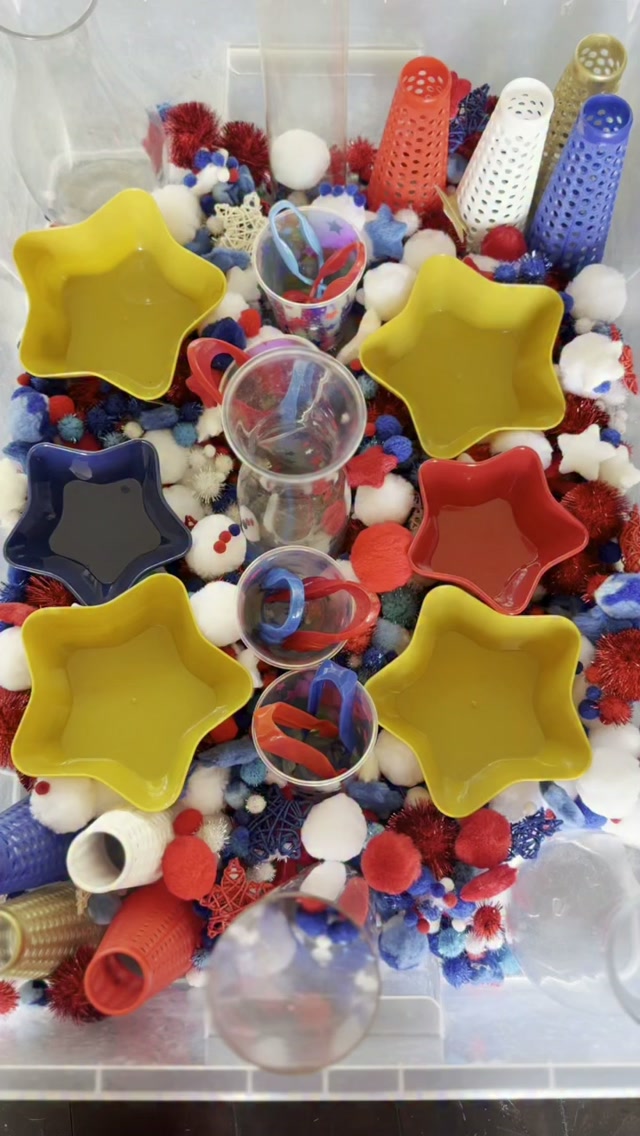 Fourth of July Pom Pom Fine Motor Sensory Bin// A red, white, & blue sensory invitation that encourages children to grasp, sort, & scoop is the perfect blend of sensory exploration, #finemotordevelopment, & early math learning. This festive hands-on invitation play was such a fun way to celebrate & explore the colors of the USA.
We filled our sensory bin with @colorationsart red, white, & blue pom poms from @discountschoolsupply alongside star loose parts, then added @learningresources tweezers, star-shaped bowls, cups, @openplaytoys cones, tubes, & carafes to encourage children to grasp, pinch, scoop, & transfer the materials in various ways. As children carefully picked up each pom pom with tweezers or their hands, they strengthened the small muscles in their hands, refined hand-eye coordination, & developed the finger control needed for future writing, cutting, & everyday self-help skills.
The materials naturally encouraged children to sort by color, count, compare sizes, estimate quantities, create patterns, & fill the containers, introducing important early math concepts through meaningful play. As they poured, transferred, filled, & emptied the different vessels, children also explored volume, spatial awareness, problem-solving, + cause & effect while experimenting with different ways to organize the materials.
One of our favorite parts of this invitation was watching each child approach the experience in their own unique way. Some carefully sorted every pom pom into matching star bowls, others challenged themselves to fill the tallest tubes or balance the materials in different containers, while some created imaginative games & colorful designs.
Invitations like this demonstrate how a handful of colorful loose parts can spark hours of meaningful learning. Through open-ended exploration, children strengthened #finemotorskills, built early math foundations, practiced problem-solving, & celebrated the red, white, & blue in a way that was playful, engaging, & full of Fourth of July fun! #tinkerwonderplay #finemotoractivity