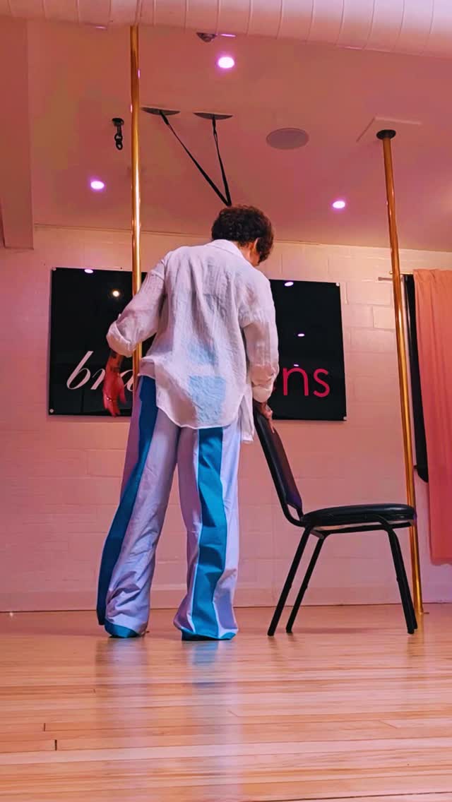 Playing with a beginner pole-chair combo for class