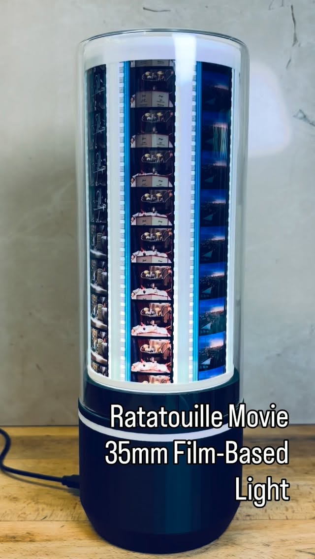 We created this unique 35mm film-based light by re-purposing actual 35mm film from the movie ‘Ratatouille’ released in 2007.
This custom light contains 56 film cells from the film. In the base we add small motor providing rotation to fully view the different scenes. A protective glass dome is then placed over the top.
We are a small family-owned business with a mission to create unique designs with the highest quality materials & expert craftsmanship. All of our products are made in our studio in Ontario, Canada. #ratatouille #ratatouille🐭